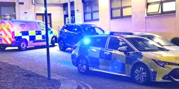 Reports of stabbing as city centre hotel surrounded by police